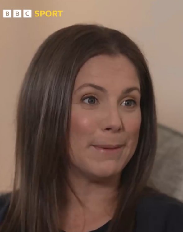 a close up of a woman 's face with the bbc sport logo in the corner