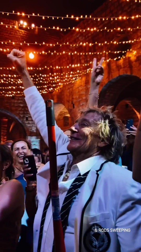 Rod Stewart was at the heart of the party during the booze wedding celebrations