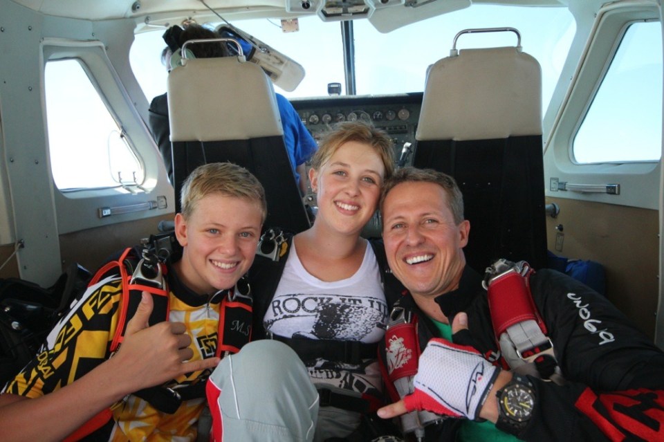 Family of skydivers in a small plane.