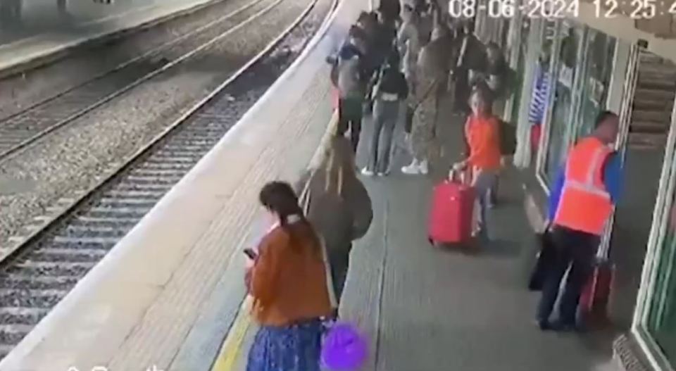 Passengers were waiting behind the yellow line before the incident