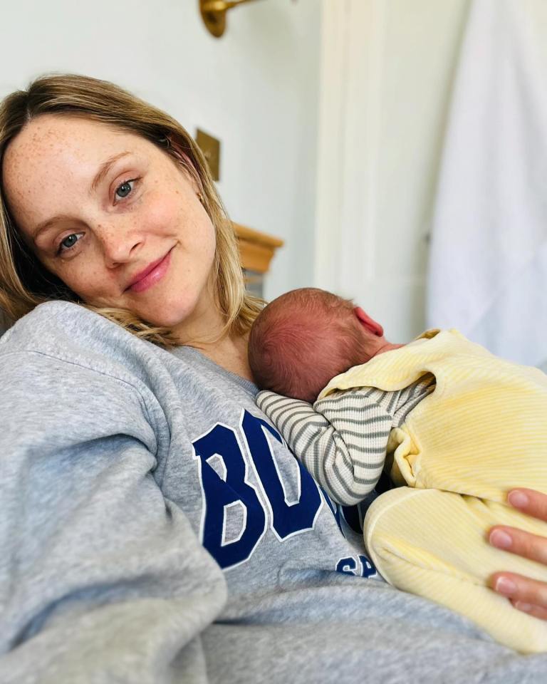 Sophie Rundle looked beautiful as she cradled her newborn