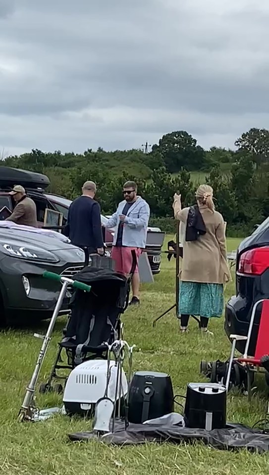 Toyboy lover Tom Child also stepped in to help at the carboot sale