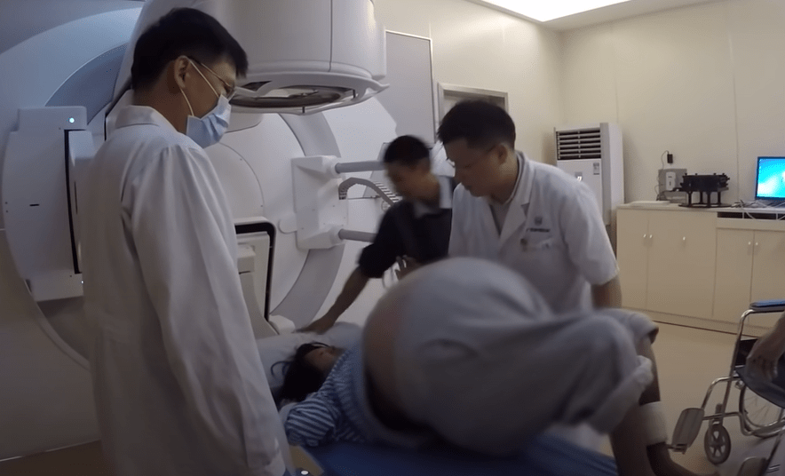 Li even struggled with the weight of the tumour while lying down