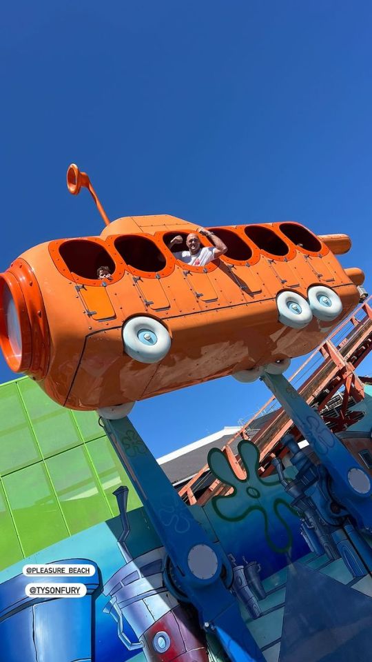 The boxer climbed into a submarine ride