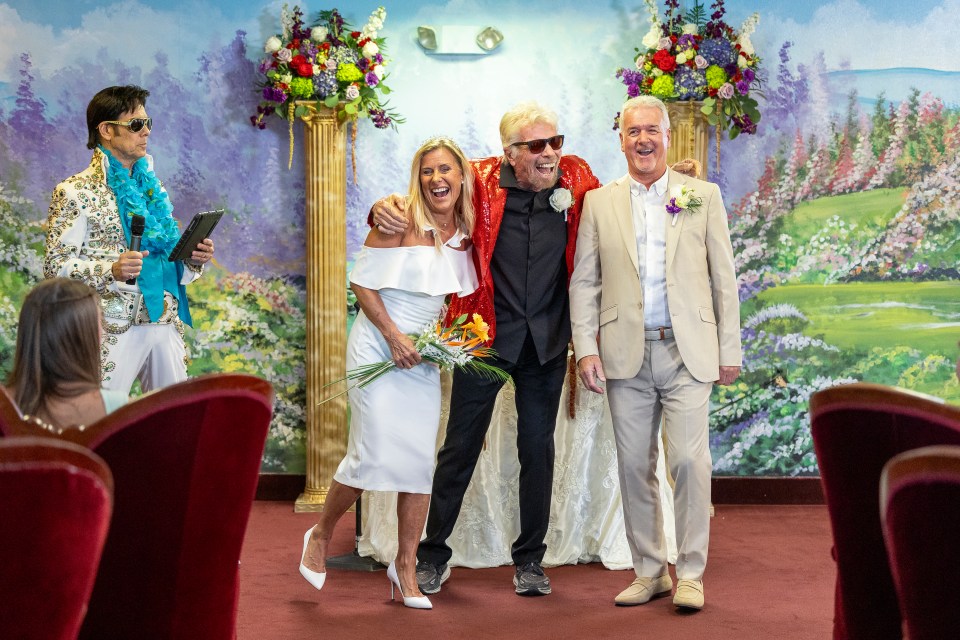 The couple from the Wirral were halfway through their vow renewal when Sir Richard stepped in to complete the ceremony in a bling red blazer and boutonniere.