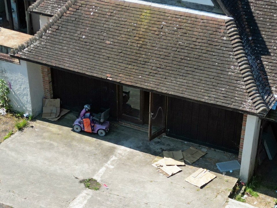 Pricey's mobility scooter could be seen abandoned outside the garage