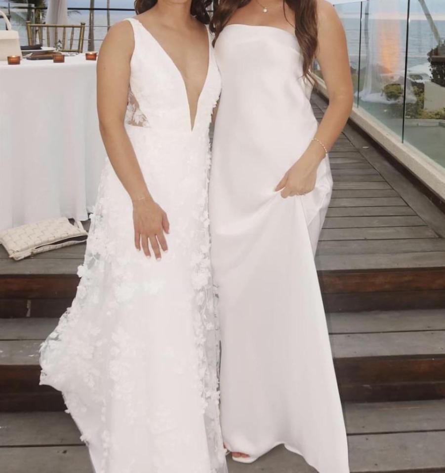 A wedding guest has caused uproar after wearing a dress that looked white