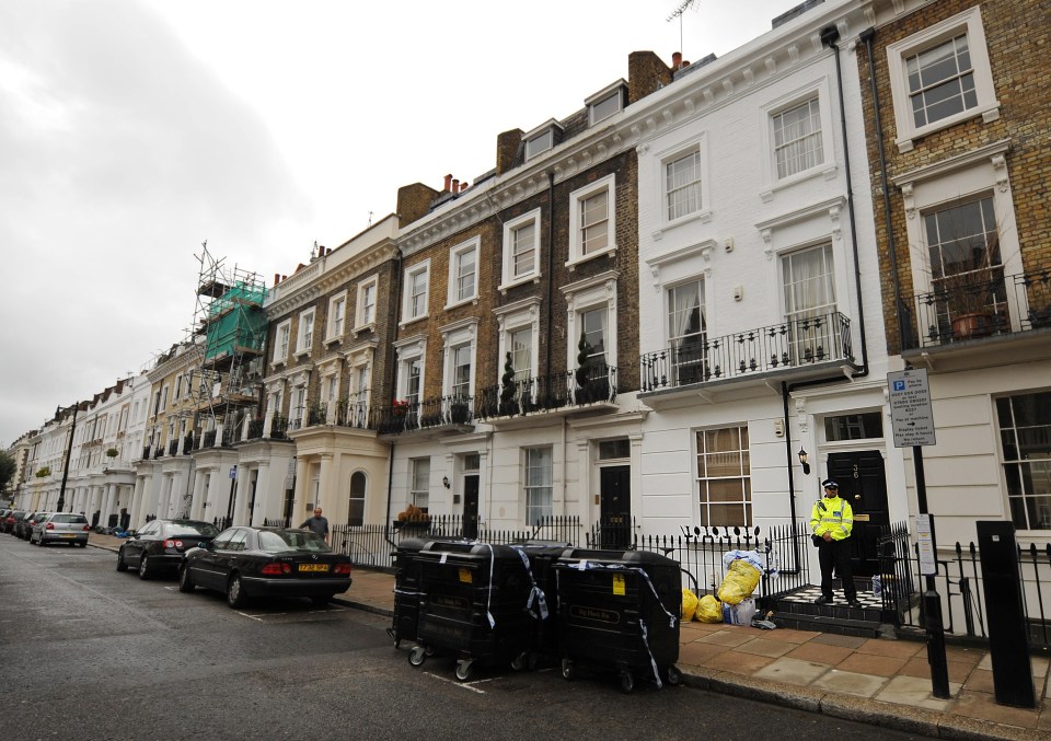 Police stood outside Gareth's flat in Pimlico, London