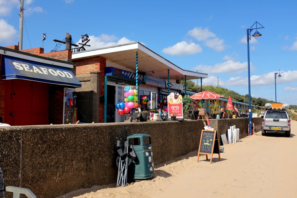 The beachside promenade has arcades, cafes and fish and chip restaurants