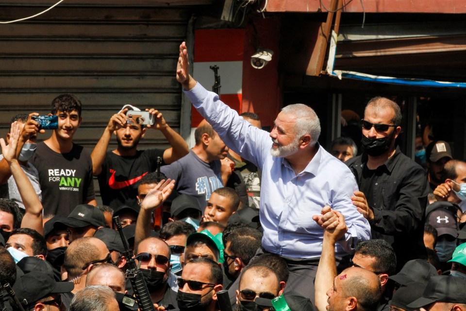 Ismail Haniyeh waves during a visit to the Ain el-Helweh camp, Lebanon’s largest Palestinian refugee camp, 2020