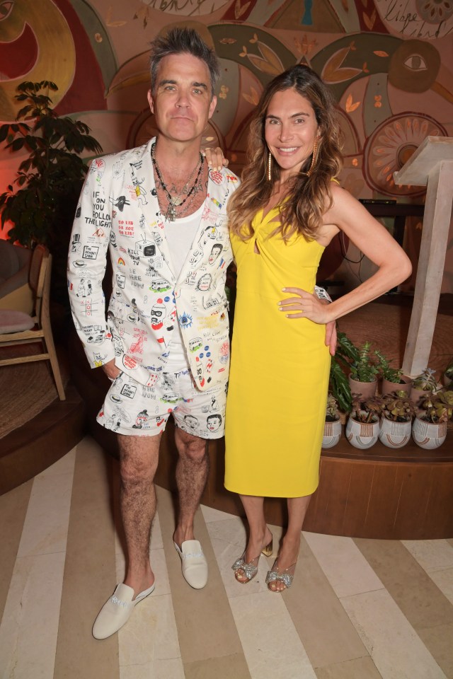 Robbie with his wife Ayda Field