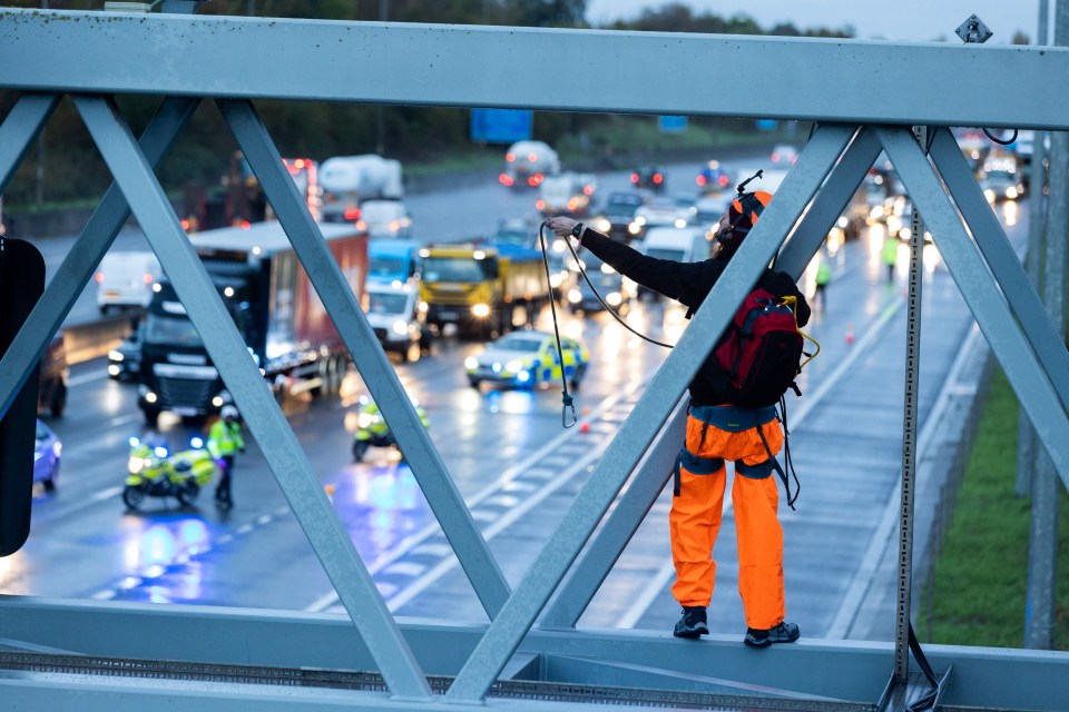 The protesters scaled gantries as they bought the motorway to a halt