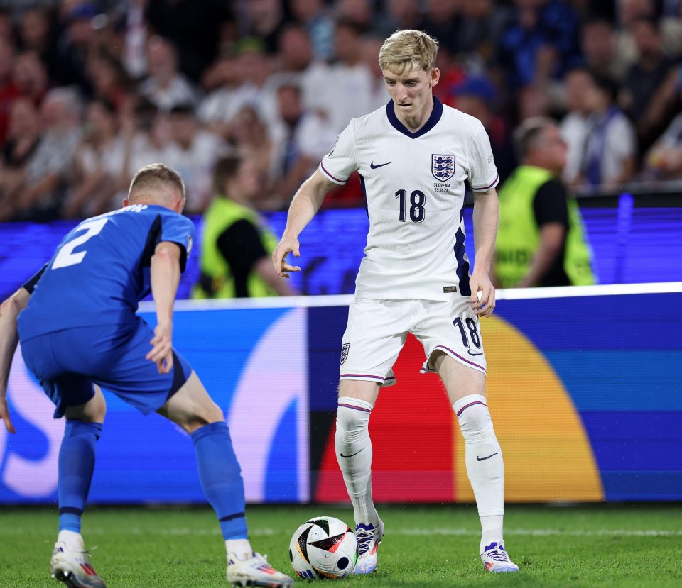 a soccer player with the number 18 on his jersey