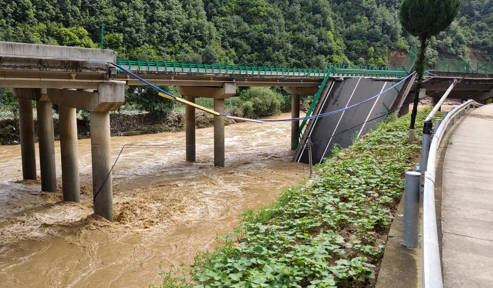 A collapsed bridge is seen in Zhashui County in Shangluo City, northwest China’s Shaanxi Province