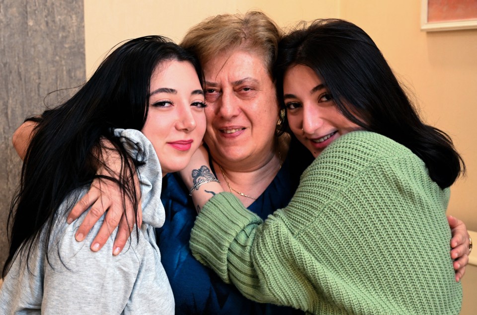 The twins with Elene’s adoptive mother, Lia Korkotadze, an economist in her 60s