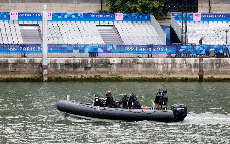 French special forces are seen on the river Seine