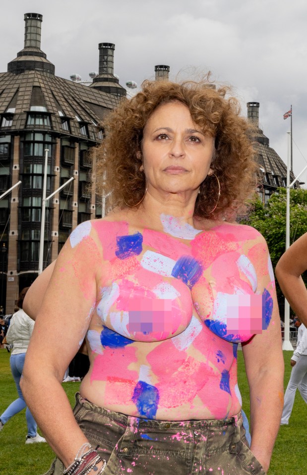 Loose Women's Nadia Sawhala toples and painted outside Parliament to get the attention of Government