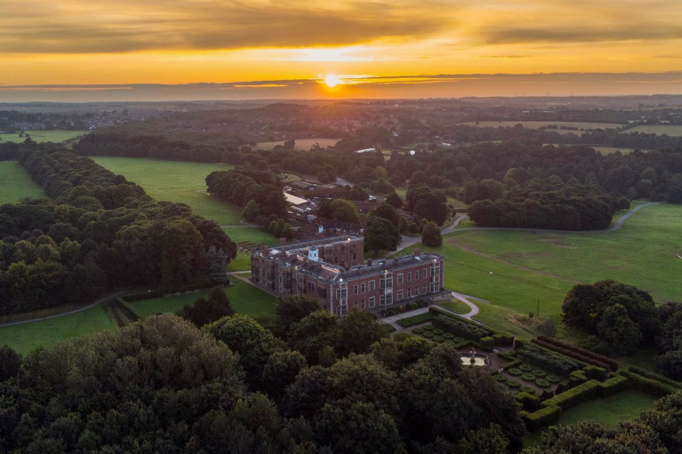 The sun rises this morning over Temple Newsam house in Leeds, Yorkshire