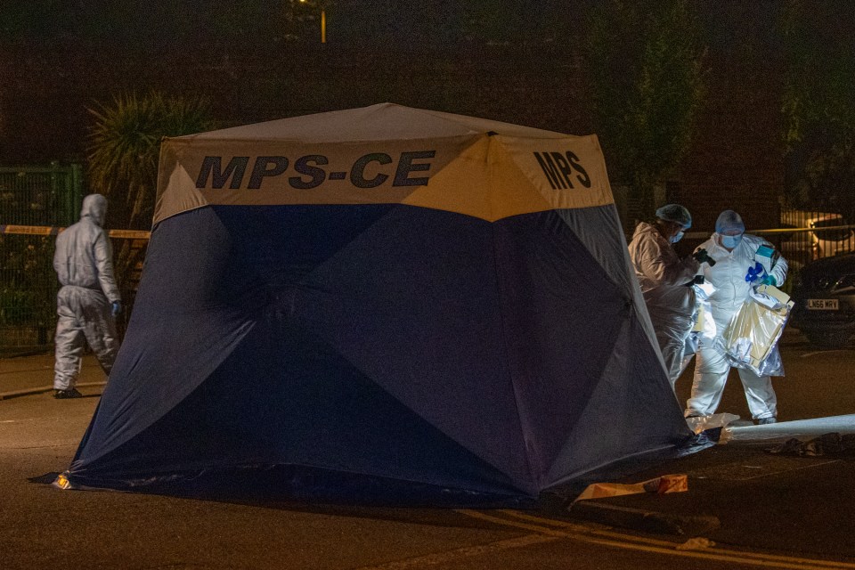 a group of people standing around a tent that says mps-ce