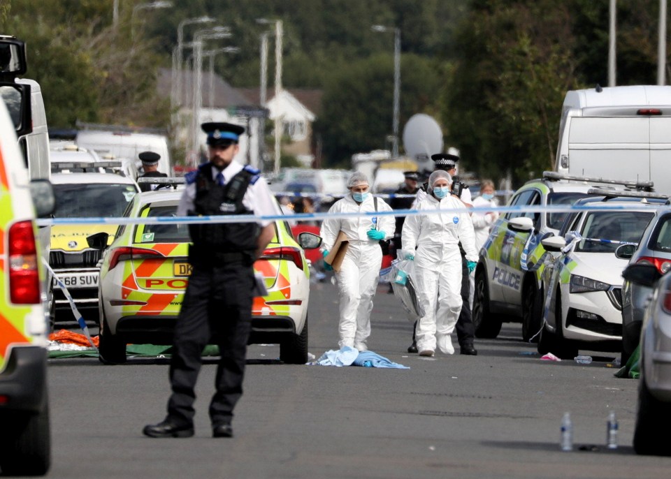 Police and forensics on the scene at Hart Street, Southport