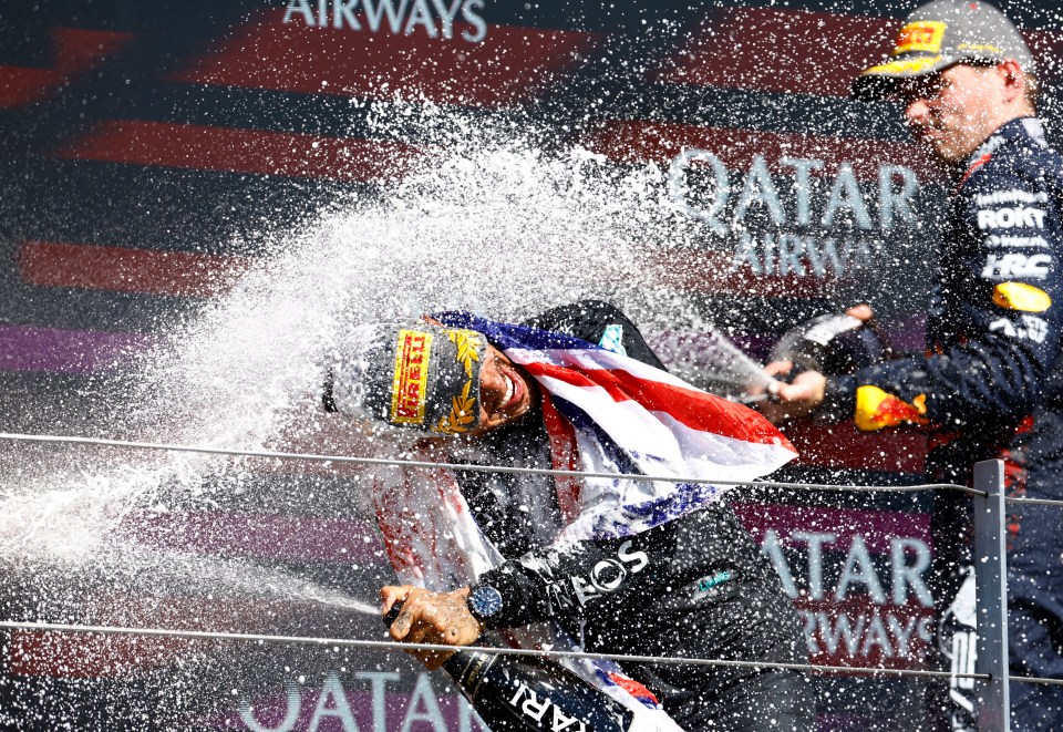 Max Verstappen and Lando Norris sprayed Hamilton with Champagne on the podium