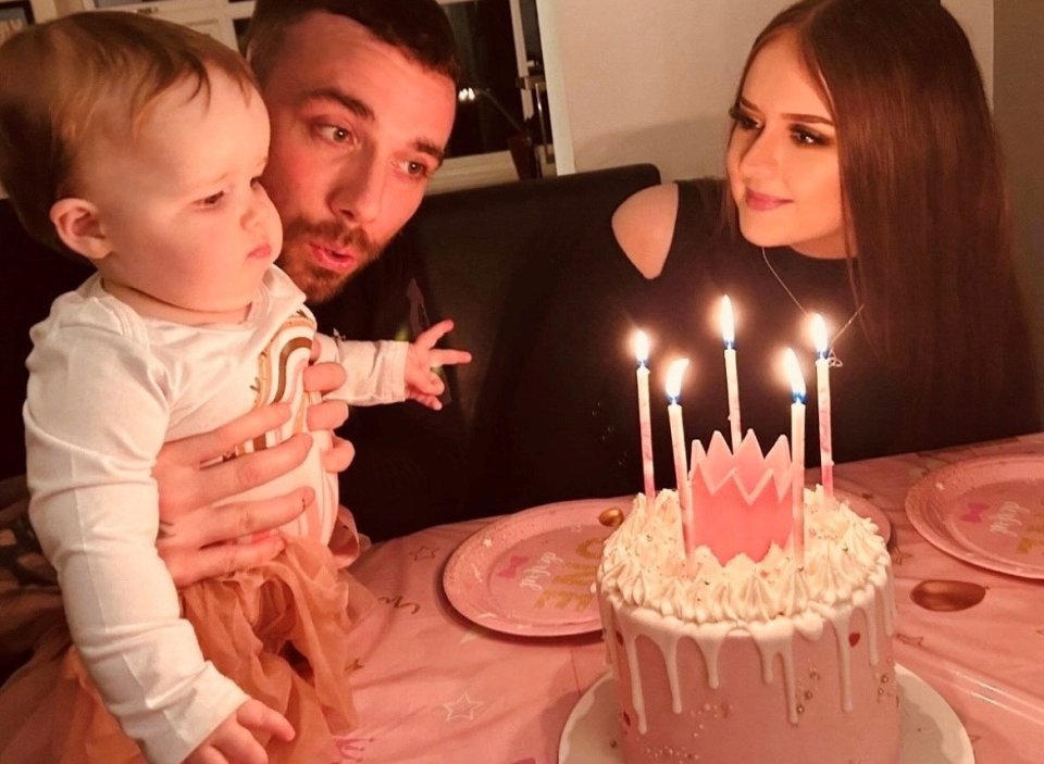 Rachael Burns, 22, with her partner Ryan and their one-year-old daughter Raeya