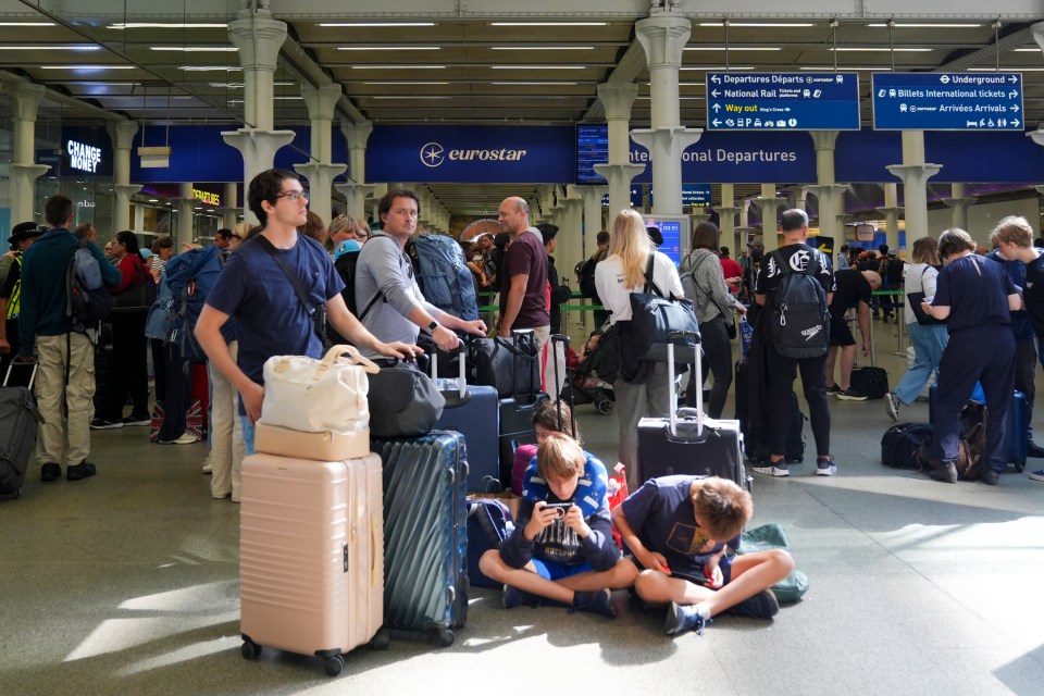 Passengers at the Eurostar terminal at St Pancras station this morning amid continued disruption