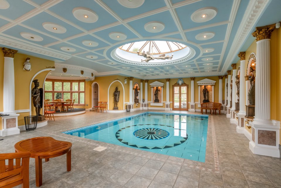 The massive home has a pool and even a museum dedicated to the retail giant