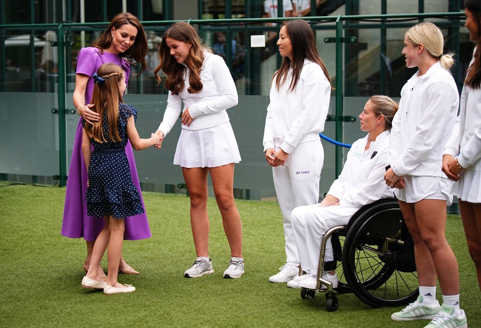 Before taking her seat, Princess Charlotte couldn't stop smiling as she met with Emma Radacanu