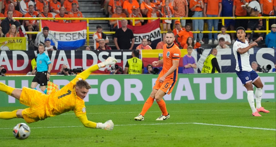 a soccer game is being played in front of an ad for waldsee