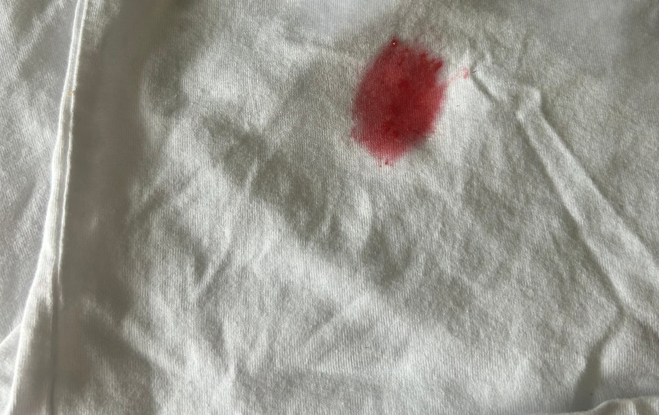 I tried out the completely free boiling water hack on a strawberry juice stain