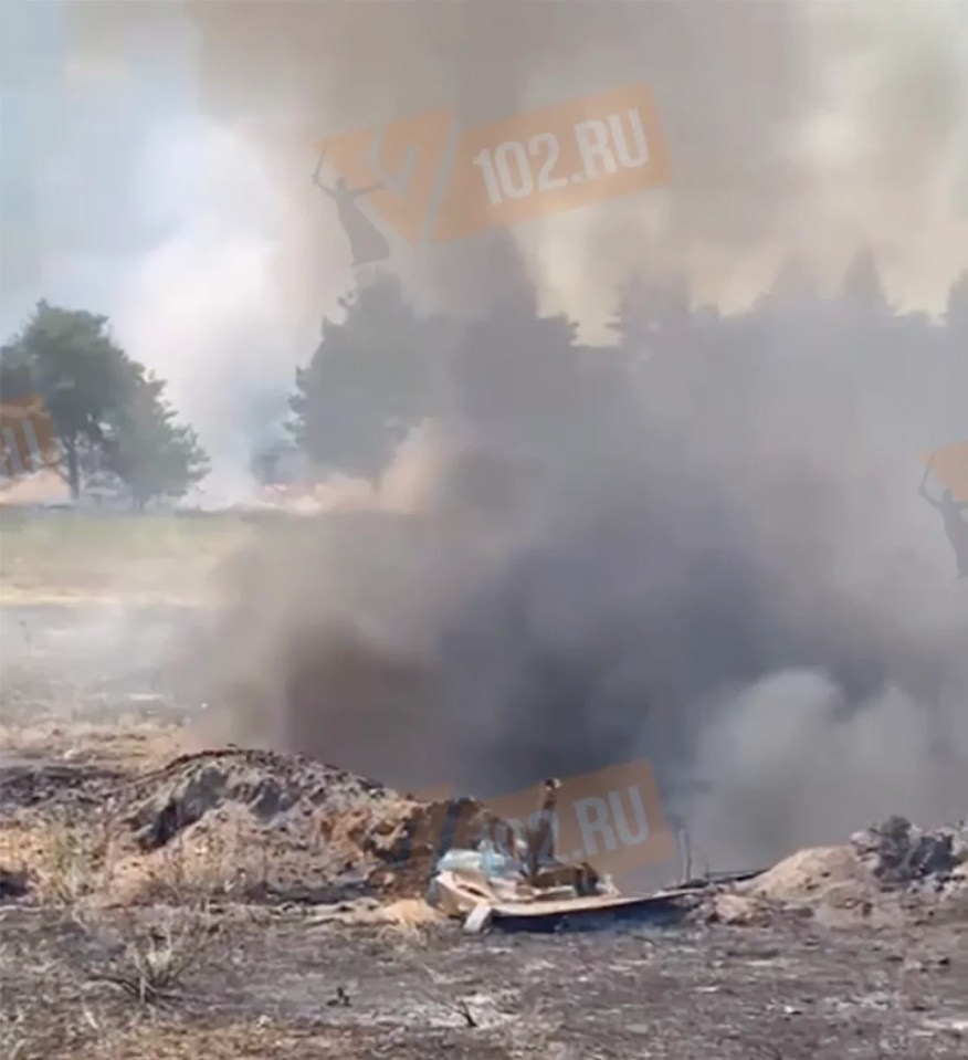 SU-34's charred wreckage can be seen in the footage