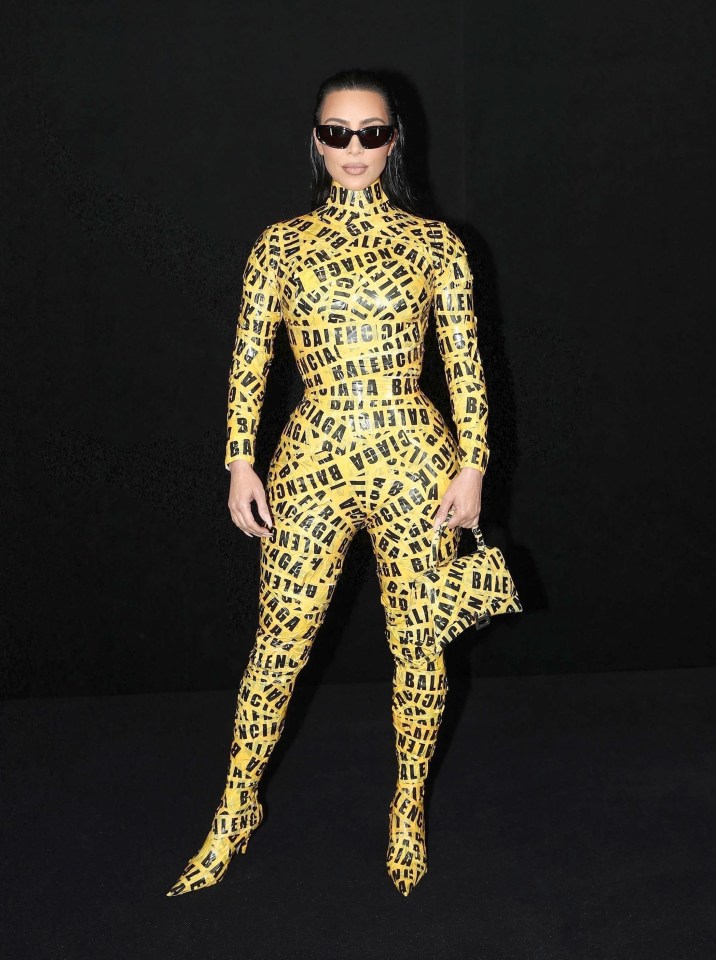 Kim Kardashian wrapped in branded caution tape for Balenciaga’s 2022 Paris Fashion Week show