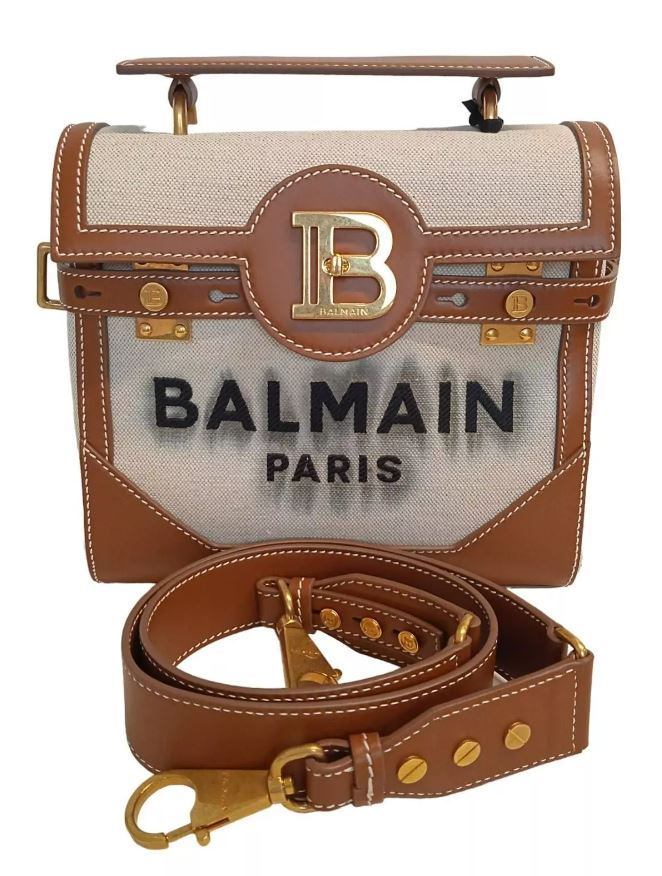 This the viral Balmain B-Buzz 23 Shoulder Bag Canvas Leather Panels, worth £1,650 is bidding at £205