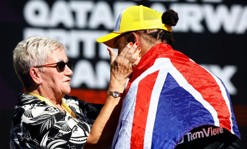 Hamilton's mum joined Carmen Larbalestier embraced him after his win