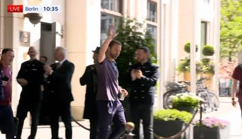 Southgate waved to fans that had come to applaud them outside their hotel