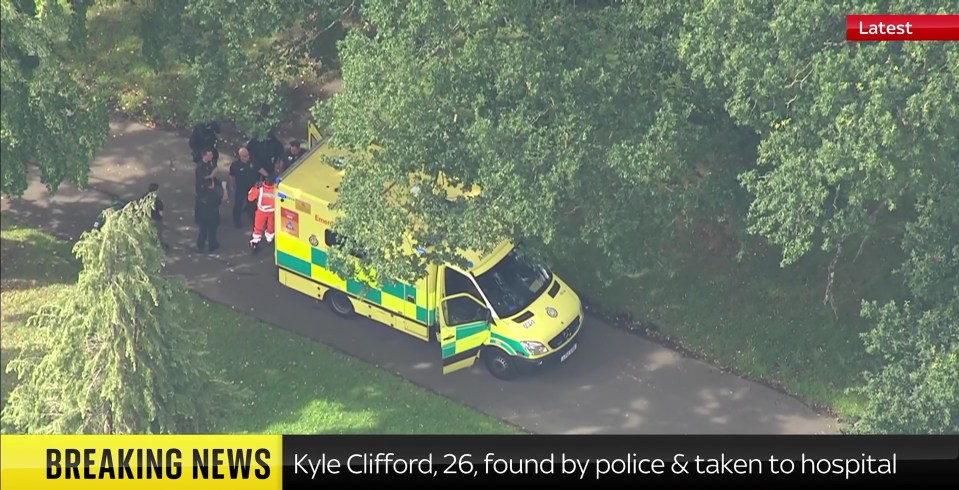 an ambulance is parked on the side of the road with breaking news kyle clifford 26 found by police and taken to hospital