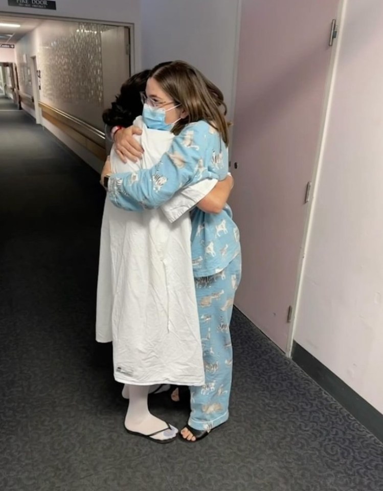 Kirsty and mum Michelle sharing a hug after the lengthy procedures