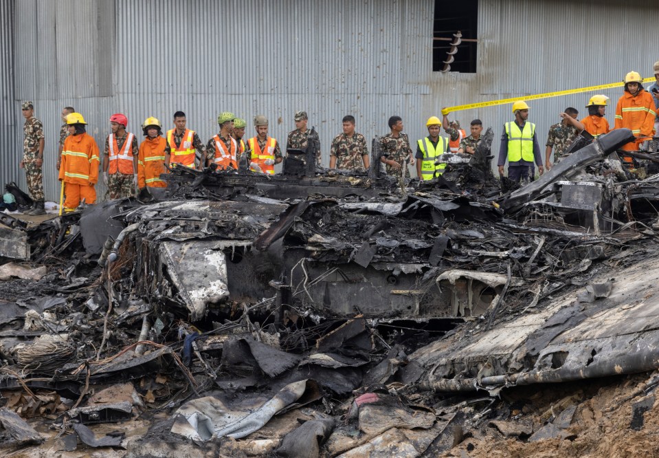 epa11493452 Rescue operations are underway at the site of a plane crash at Tribhuvan International Airport in Kathmandu, Nepal, 24 July 2024. According to a statement by the Civil Aviation Authority of Nepal (CAAN), a Saurya Airlines aircraft heading from Kathmandu to the resort town of Pokhara and carrying 19 people crashed during take off at Tribhuvan International Airport. The bodies of 18 people were recovered while one injured person was taken to hospital. EPA/NARENDRA SHRESTHA