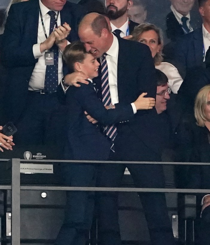 Heart-warming moment Prince William hugs son George, 10