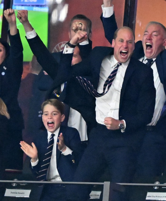 The father-son duo leapt into the air and pumped their fists as England scored their first goal