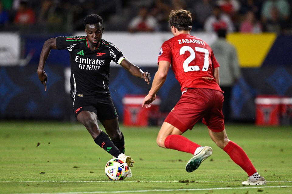 CARSON, CALIFORNIA - JULY 24: Eddie Nketiah #14 of Arsenal FC controls the ball while defended by Illya Zabarnyi #27 of AFC Bournemouth during the first half at Dignity Health Sports Park on July 24, 2024 in Carson, California. (Photo by Orlando Ramirez/Getty Images)