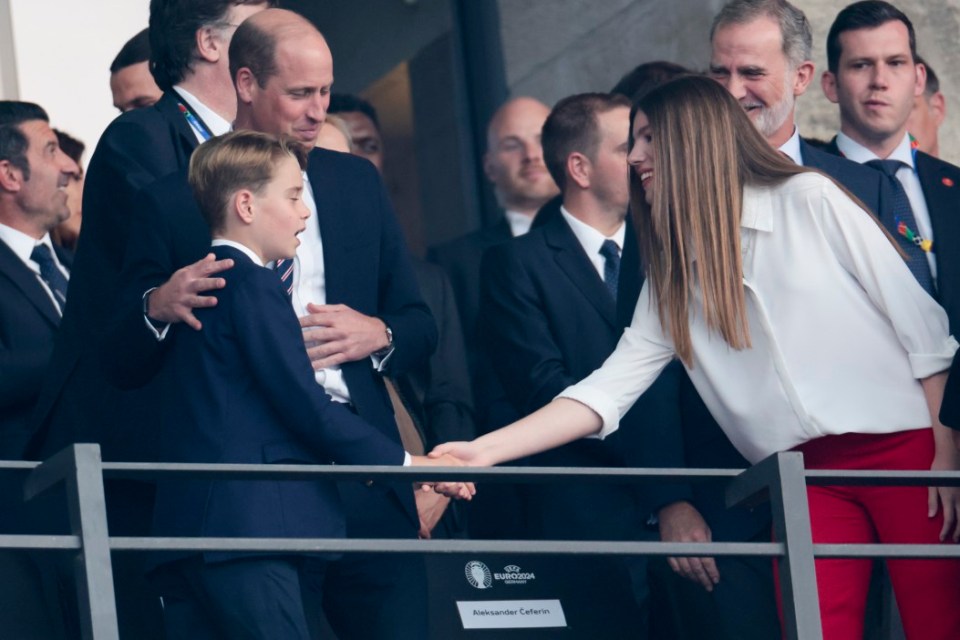 Queen Sofia of Spain shook hands with the young Royal