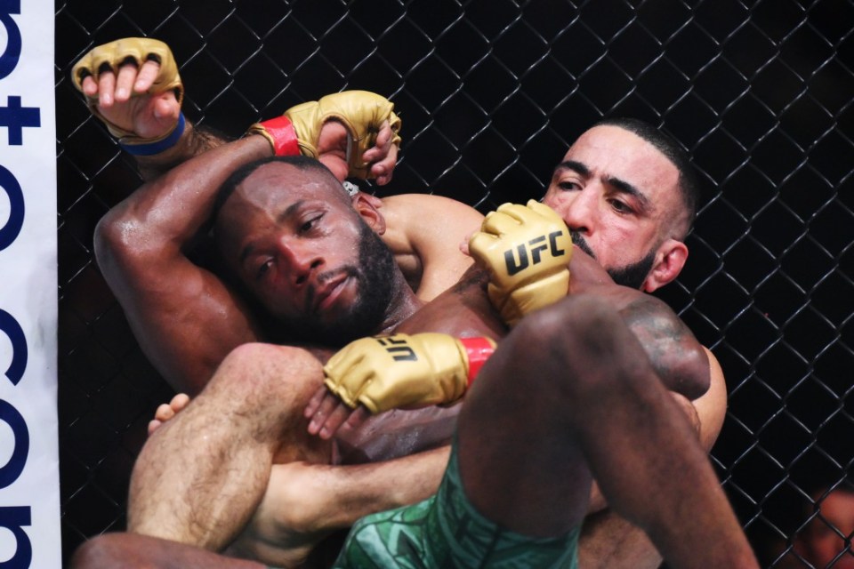 MANCHESTER, ENGLAND - JULY 28: Belal Muhammad works for a submission against Leon Edwards of Jamaica at Co-op Live on July 28, 2024 in Manchester, England. (Photo by Ben Roberts Photo/Getty Images)