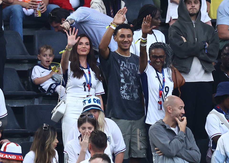 a man wearing a shirt that says ' unity ' on it