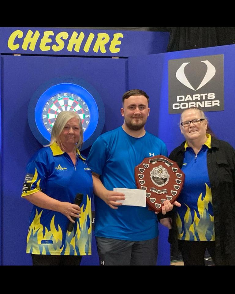 Luke Littler posed for a photo after winning the Cheshire Open