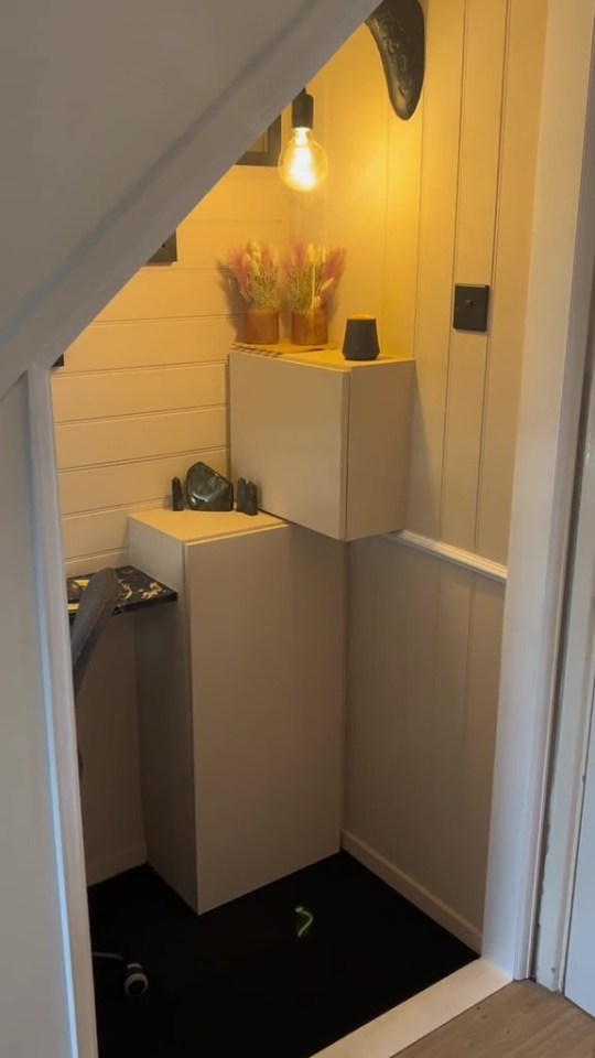 A woman showed how she turned her cupboard under the stairs into a stylish office