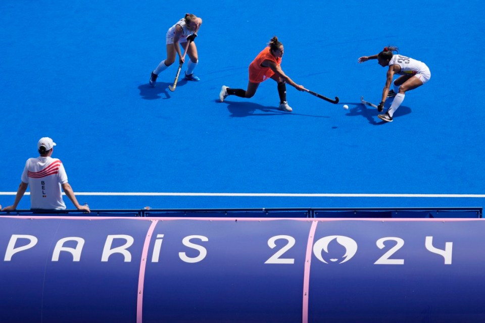 Players of the Argentina and Belgium women's hockey teams participate in a practice game at the Yves-du-Manoir Stadium at the 2024 Summer Olympics, Thursday, July 25, 2024, in Colombes, France. (AP Photo/Anjum Naveed)