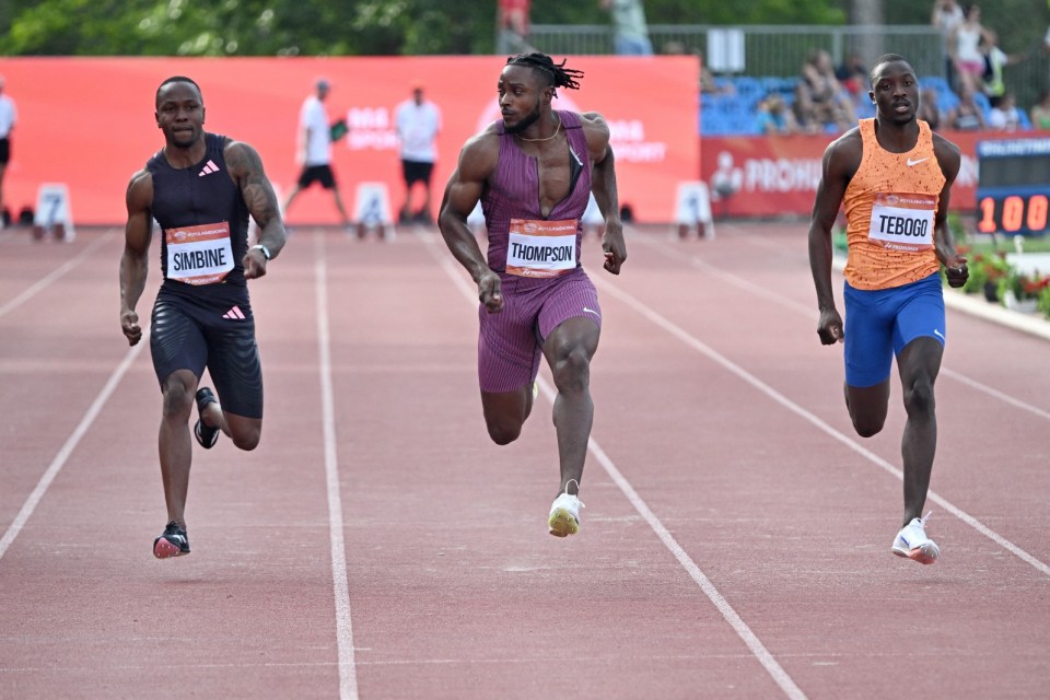 Kishane Thompson, centre, competing in Hungary in 2024