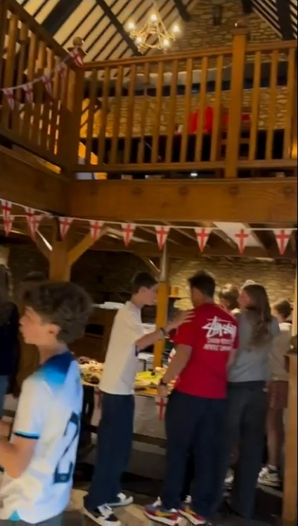 Footage posted to social media shows the 64-year-old right at home, albeit surrounded by boxes, as he and the locals gear up for the match